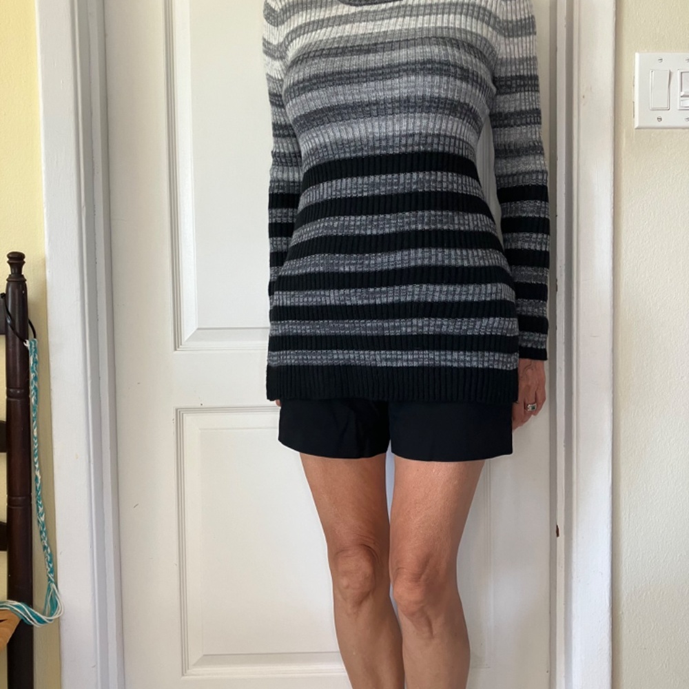 Sweater size large, black gray stripes, long sleeve.